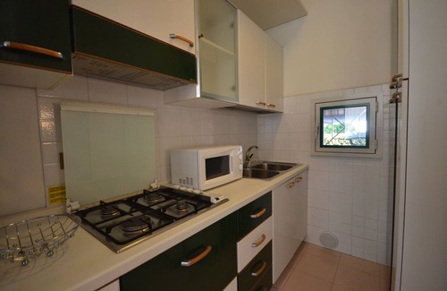 Bibione Apartamento | Apartamento vacacional con balcón y piscina