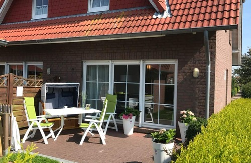Carolinensiel Apartamento | Holiday home family and dog