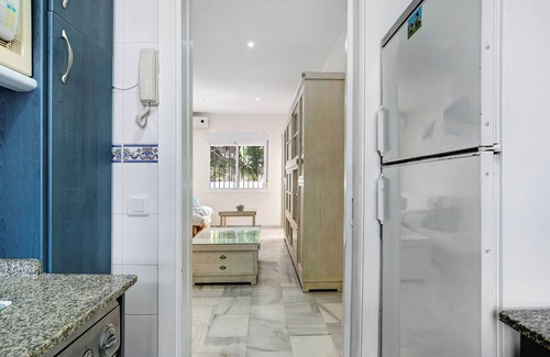Poblado Sancti Petri Apartamento | Apartamento vacacional "El Velero" con piscina compartida, terraza privada y Wi-Fi