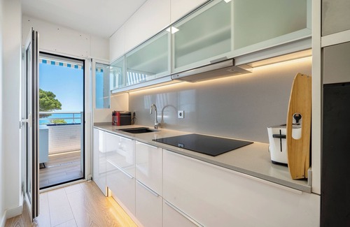 Miami Platja Apartamento | Apartamento vacacional "La Rosaleda" con vistas al mar, piscina compartida y Wi-Fi