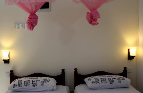 Kudapaduwa Cama Y Desayuno | Holiday Guest Inn