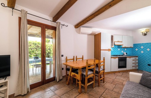 Porto San Paolo Casa | Casa de vacaciones "Villa Teresa" con piscina compartida, terraza privada y aire acondicionado