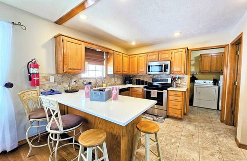 Holiday Island Casa | Holiday Haven On The Island! Sleeps 12! Fire pit! 6-Seater Golf Cart option!