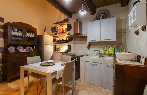 Paulilatino Casa | Casa de vacaciones "Antica dimora" con jardín y aire acondicionado