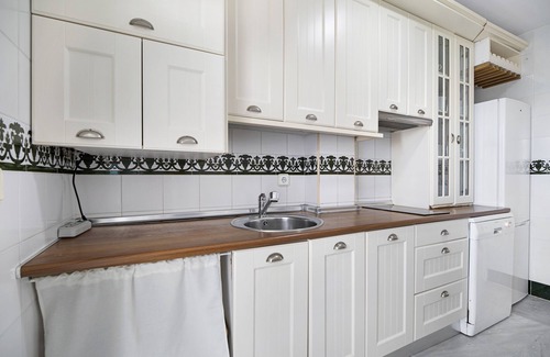 Poblado de Sancti Petri Apartamento | Casa de vacaciones 'Apartamento El Marinero' con piscina compartida, Wi-Fi y aire acondicionado