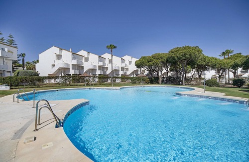 Poblado de Sancti Petri Apartamento | Casa de vacaciones 'Apartamento El Marinero' con piscina compartida, Wi-Fi y aire acondicionado