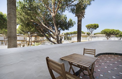 Poblado de Sancti Petri Apartamento | Casa de vacaciones 'Apartamento El Marinero' con piscina compartida, Wi-Fi y aire acondicionado