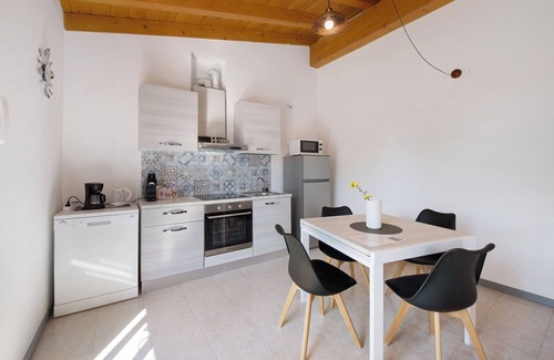 Montioni Casa | Casa de vacaciones 'Appartamenti Villa Fiorito' con vistas al lago, Wi-Fi y aire acondicionado