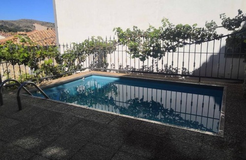 Tronchon Casa | Casa de vacaciones 'Casa Conesa I' con vistas a la montaña, piscina privada y Wi-Fi