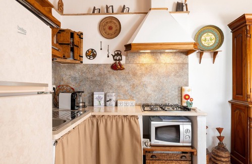 Baunei Casa | Casa de vacaciones 'Casa Della Nonna Nel Borgo' con vistas a la montaña, jardín privado y Wi-Fi