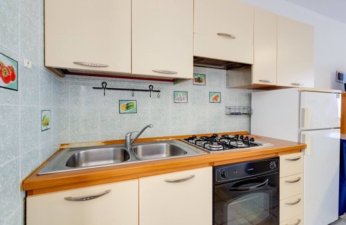 Funtana Meiga Casa | Holiday Home 'Casa Funtana Meiga' close to the Beach with Sea View, Shared Garden & Terrace