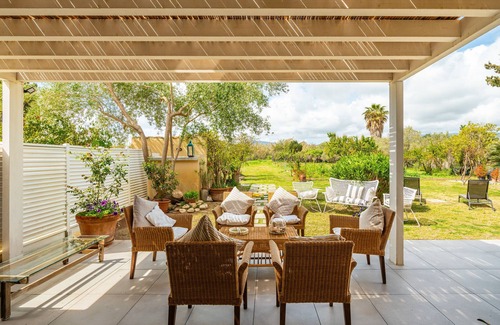 Pula Casa | Casa de vacaciones 'Casa Peppina Sulla Spiaggia' con terraza privada, Wi-Fi y aire acondicionado