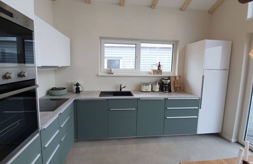 Wangerland Apartamento | Casa de vacaciones Chalet Wilde Wiese