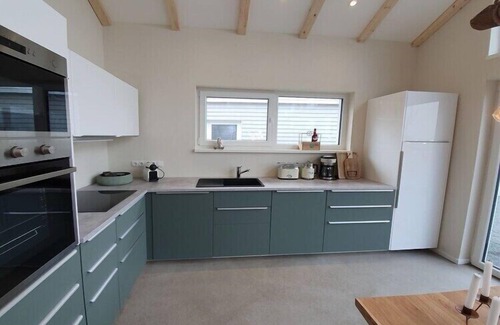 Wangerland Apartamento | Casa de vacaciones Chalet Wilde Wiese
