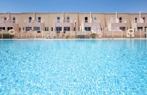 Caleta de Fuste Apartamento | Casa vacacional 'Duplex Amuley Mar' con terraza privada, piscina y Wi-Fi