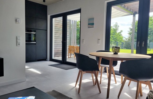 Muldestausee Casa | Casa de vacaciones 'Ferienhaus Schlossterrassen 4a' con vistas al lago, terraza privada y Wi-Fi