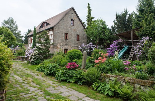 Graupa Casa | Casa de vacaciones 'Ferienhaus Zum Rundling' con terraza privada, jardín compartido y Wi-Fi