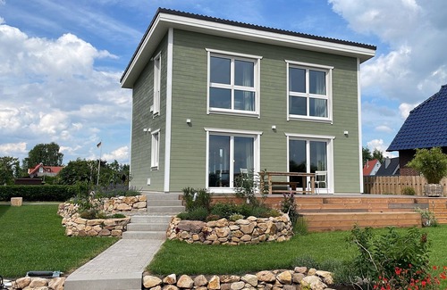 Bedekaspel Casa | Holiday Home 'Haus Am Meer 8' with Lake View, Private Terrace and Private Garden