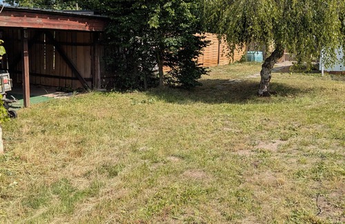 Calau Casa | Casa de vacaciones 'Haus Im Grünen' con terraza privada, jardín compartido y Wi-Fi