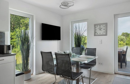Tossens Casa | Casa de vacaciones 'Haus Sophia' con vistas al lago, terraza privada y Wi-Fi