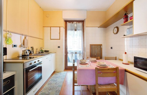 Como Casa | Casa de vacaciones "Casa de Rosas" con terraza privada y Wi-Fi