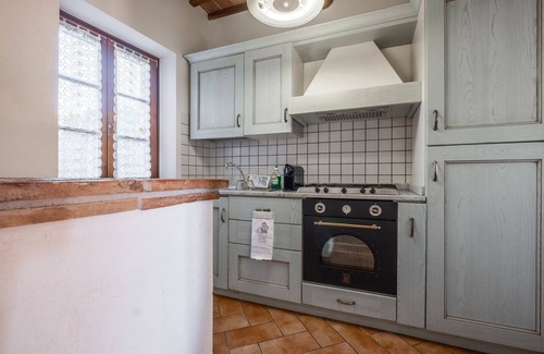 Casone Casa | Casa de vacaciones 'La Casetta Del Caminetto' con piscina compartida, jardín compartido y balcón