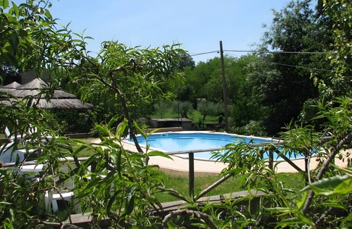 Casone Casa | Casa de vacaciones 'La Casetta Del Caminetto' con piscina compartida, jardín compartido y balcón