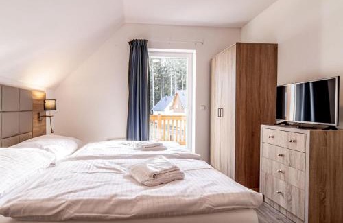 Lojzova Paseka Casa | Holiday Home Lakeside Village 8 - - sauna by Interhome
