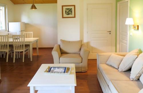 Parentis-en-Born Casa | Holiday Home Les Cottages du Lac M3 by Interhome