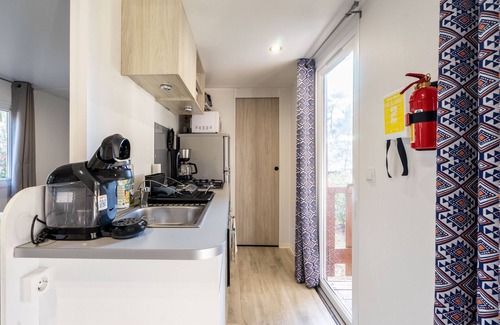 Les Mathes Casa | Casa de vacaciones 'Mobil Home La Palmyre' con piscina compartida y terraza privada