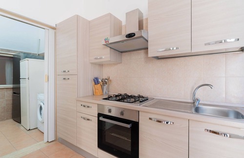 Torre Lapillo Casa | Casa de vacaciones 'Nina' con jardín privado y aire acondicionado
