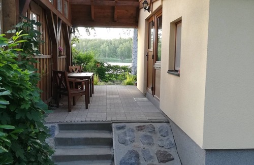 Malschwitz Casa | Casa de vacaciones en Olbasee con acceso privado al agua, muelle, bote y casa de juegos
