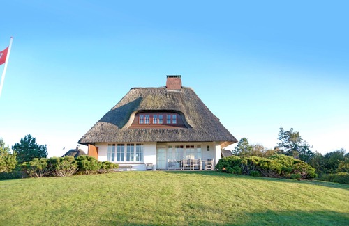 Greveling Casa | Casa de vacaciones 'Reetdachhaus' con vistas al mar, terraza privada y Wi-Fi