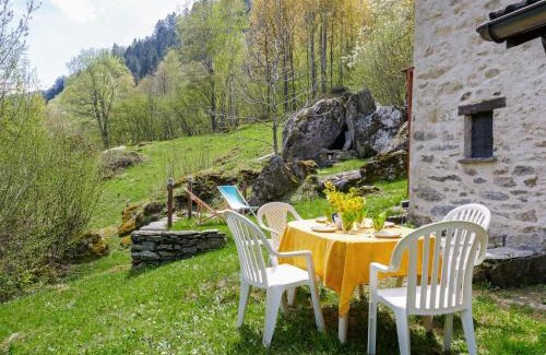 Acquarossa Casa | Holiday Home Rustico L'Hibou by Interhome