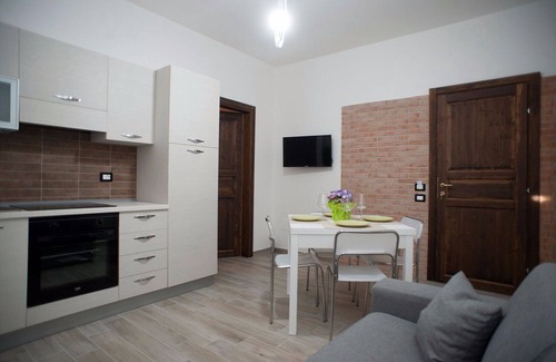 Bovara Apartamento | Casa de vacaciones al atardecer