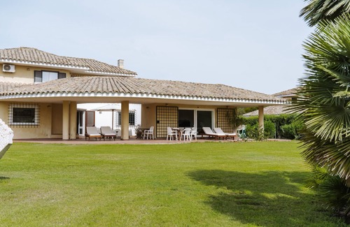 Pula Casa | Casa de vacaciones 'Villa Degli Olivi' con vistas al mar, jardín, terraza y Wi-Fi