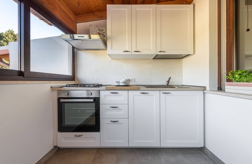 Torre degli Ulivi Casa | Casa de vacaciones 'Villa Eleonora Residence App To 1' con piscina compartida