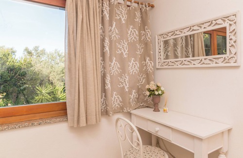 Pittulongu Casa | Casa de vacaciones "Villa Rosa sul Mare" con vistas al mar, terrazas y Wi-Fi