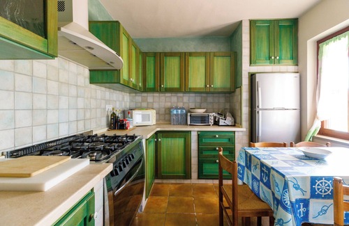 Santa Caterina Casa | Casa de vacaciones 'Villetta Macchia Mediterranea' con vistas al mar, terraza y jardín privado