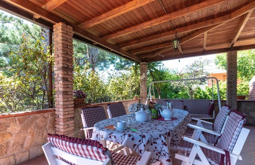 Cala Sinzias Villa | Encantadora casa con aire acondicionado, jardín y terraza; Estacionamiento disponible; Mascotas permitidas