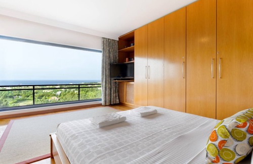 Koskinou Villa | Casa de vacaciones con impresionantes vistas de la ciudad y el mar.