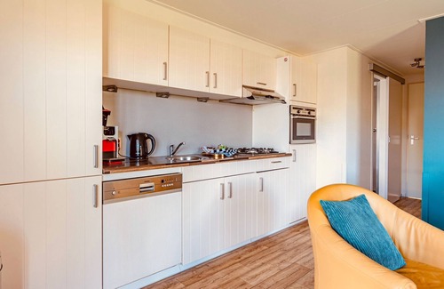 Giethoorn Chalet De Esquí | Holiday home with terrace in Giethoorn