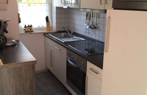 Greetsiel Casa | Casas de vacaciones y Apartamentos en el corazón de Greetsiel, modernos, cómodos + acogedores, Internet