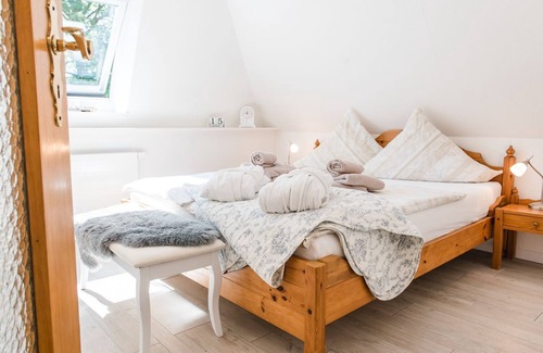 Langballigholz Otro | Casa de vacaciones con vistas al mar y sauna, chimenea y jardín de invierno ubicada directamente en el bosque