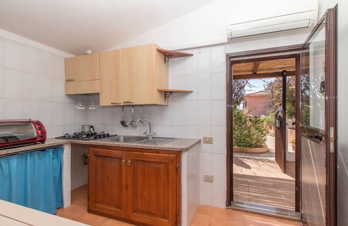 Capo Testa Apartamento | Apartamento vacacional 'Giovanni' con vistas al mar, terraza privada, aire acondicionado y Wi-Fi
