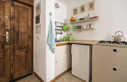 Alghero City Centre Apartamento | FIESTA EN ALGHERO - Tarjeta de hospitalidad (Cod. IUN P0350)