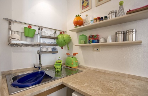 Alghero City Centre Apartamento | FIESTA EN ALGHERO - Tarjeta de hospitalidad (Cod. IUN P0350)