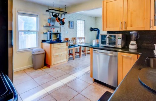 Madison Heights Casa | Home in Royal Oak w/ pool & sauna & dream garage
