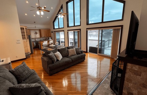 Kauneonga Lake Villa | Home king luxury, waterfront hot tub, family , indoor pool, private beach