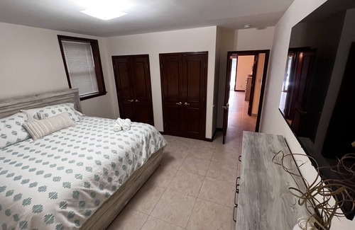 Kauneonga Lake Villa | Home king luxury, waterfront hot tub, family , indoor pool, private beach